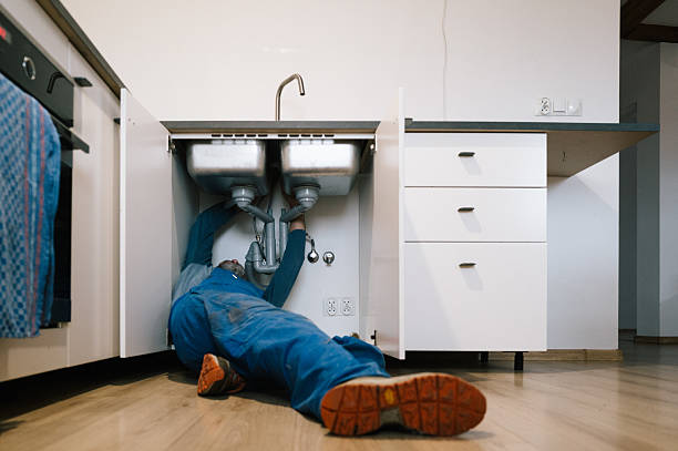 Professional Drain Cleaning technician working in West Newton, IN
